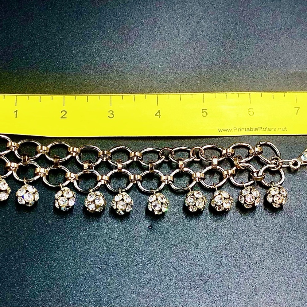 Gold and Silver Charm Bracelet with Fringe Design